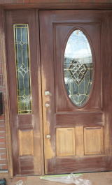 玄関ドアに真鍮板を貼ったリフォーム塗装例